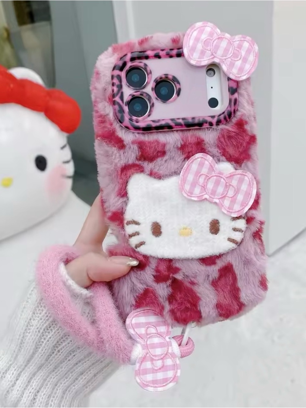 Pink Fur Hello Kitty Phone Case with Bow Accent